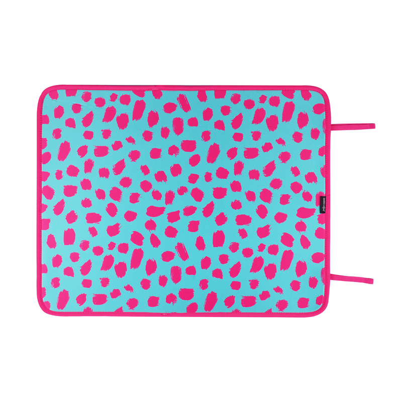 A vibrant teal cheetah poolside seating mat with a leopard print pattern and a matching pink elastic band closure by Emerson West.